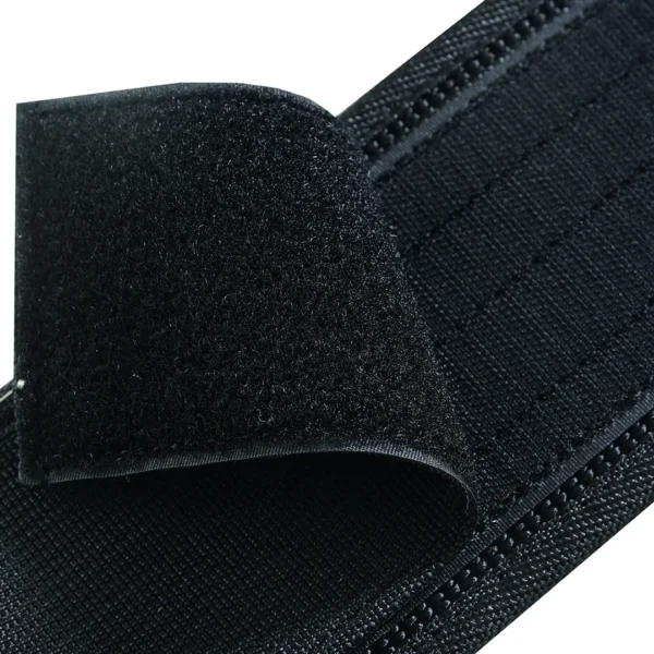 detailed view of quick release weightlifting belt made of durable black nylon